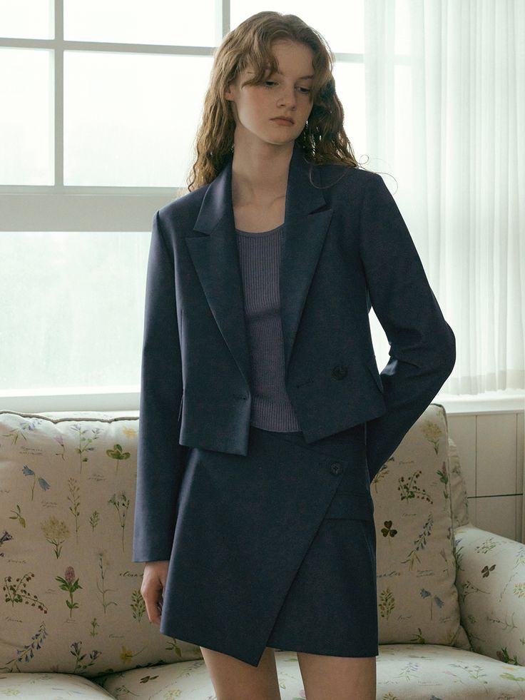 Editor's Notes Soft and structured, this cropped length jacket features notched lapels and wrap style front silhouette. It is accentuated with double button fastenings for formal and refined mood. - Stretchy rayon blend fabric- Wide notched lapels- Trendy cropped length design- Side flap pockets- Versatile styling and easy layeringMeasurements(in.)Size (S/M)- Length: 18.11 in / 18.31 in - Bust: 19.09 in / 20.08 in - Shoulder: 16.14 in / 16.54 in - Sleeve length: 24.02 in / 24.21 in - Sleeve width: 7.09 in / 7.28 in* Model info: Height 5' 7 Bust 32 Waist 24 Hip 34.5 Composition & Care- 78% Polyester, 16% Rayon, 6% Spandex - Dry Cleaning only Designer- by VERBE Cropped Jacket With Double Button Closure For Work, Workwear Cropped Jacket With Double Button, Cropped Workwear Jacket With Double Button Closure, Formal Cropped Outerwear With Double-breasted Button, Elegant Cropped Jacket With Double-breasted Button, Formal Double-breasted Cropped Jacket, Chic Formal Cropped Jacket With Double-breasted Buttons, Cropped Double Button Work Blazer, Tailored Cropped Jacket With Notch Lapel For Semi-formal Occasions