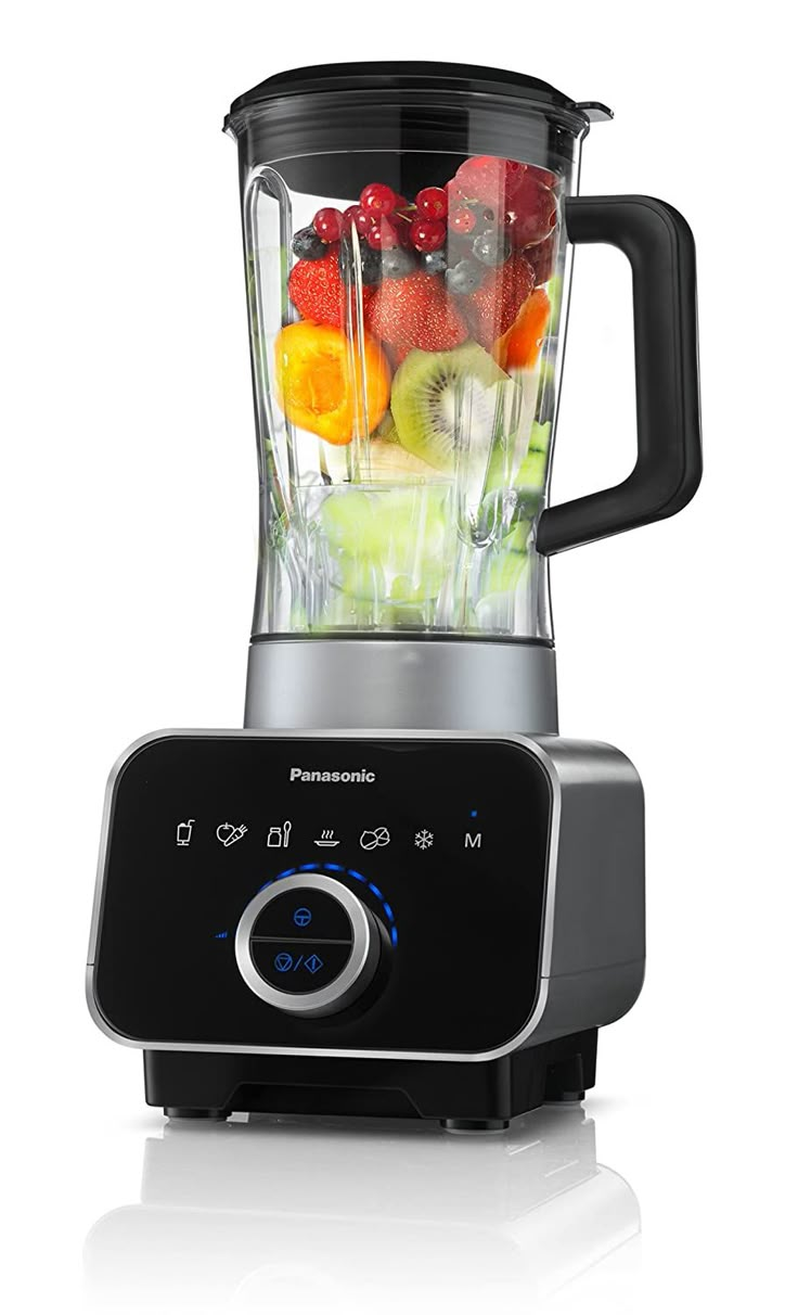 a blender filled with lots of different types of fruit