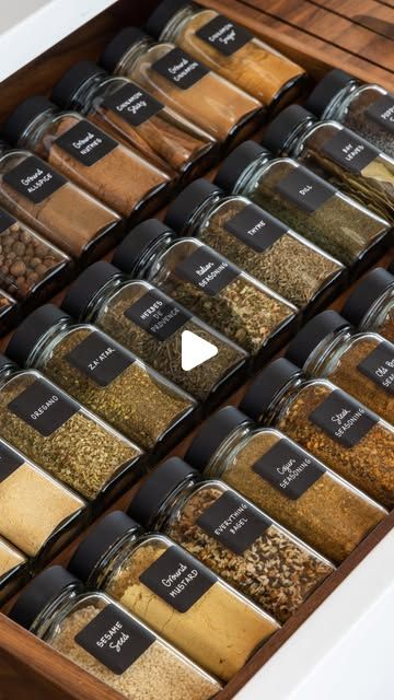 an open drawer filled with lots of different types of spices