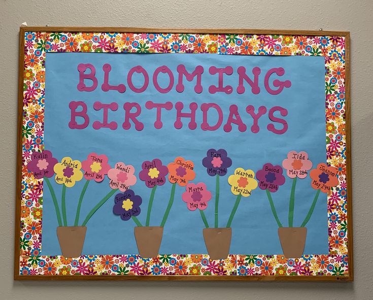 a bulletin board with flowers and the words blooming birthday's written on it