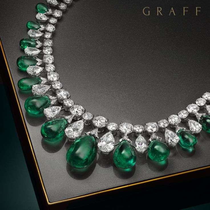 True Perfection On display at Graff’s Monaco Rare Jewels Exhibition at the Salle Empire, Hotel de Paris, this extraordinary cabochon drop necklace incorporates 199 carats of magnificent emeralds, perfectly colour matched to create an incredible three dimensional design. Over 100 carats of the finest diamonds complement the vibrancy of the gems and create a scintillatingly stunning effect. #GraffDiamonds #RareJewelsExhibition #Emerald #Cabochon Luxury Diamond And Gemstone Pearl Necklace, Luxury Yellow Gold Round Bridal Necklace, Luxury Multi-stone Classic Necklaces, Luxury Yellow Gold Emerald Engagement Necklace, Luxury Green Temple Necklace For Ceremonial Occasions, Drop Emerald Necklaces For Formal Occasions, Emerald Drop Necklace For Formal Occasions, Formal Drop Emerald Necklace, Exquisite Jeweled Emerald Necklace For Anniversary