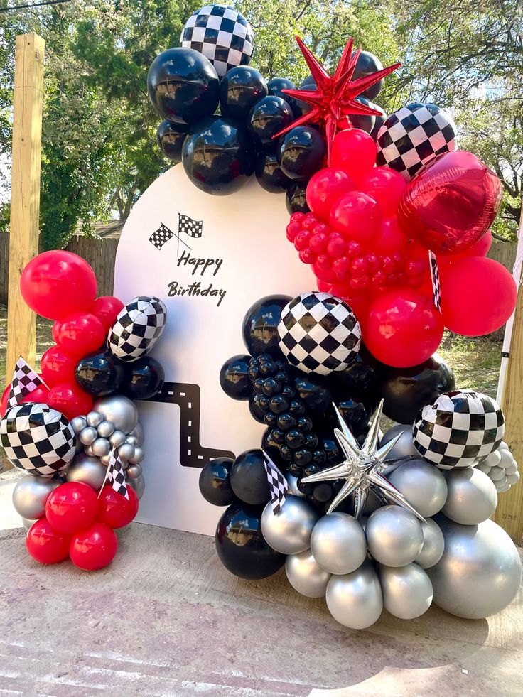 a birthday decoration made out of balloons