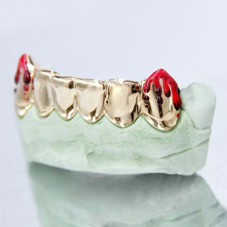 Real look of actual blood dripping! If you’re looking for gold grillz unlike any other you will see on the market this is it. Looks like actual real blood dripping down the fang teeth. Fang Teeth, Bottom Grillz, Grillz Teeth, Grill Ideas, Gold Grill, Blood Drip, Gold Grillz, Gold Teeth, Chevy Nova