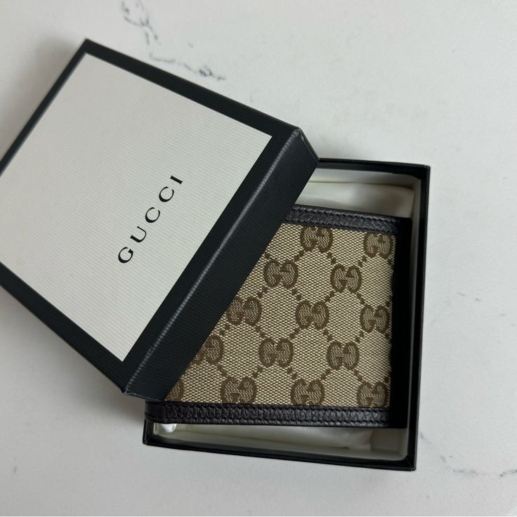 Brand New. Comes With Poached And Box. Unisex Designer Brown Wallet As Gift, Designer Beige Wallets As A Gift, Designer Beige Wallets As Gift, Designer Gucci Wallets For Everyday, Designer Beige Wallets For Gift, Brown Wallet As A Gift, Classic Gucci Bag With Card Slots, Beige Wallet With Original Box As Gift, Luxury Tan Wallet As Gift