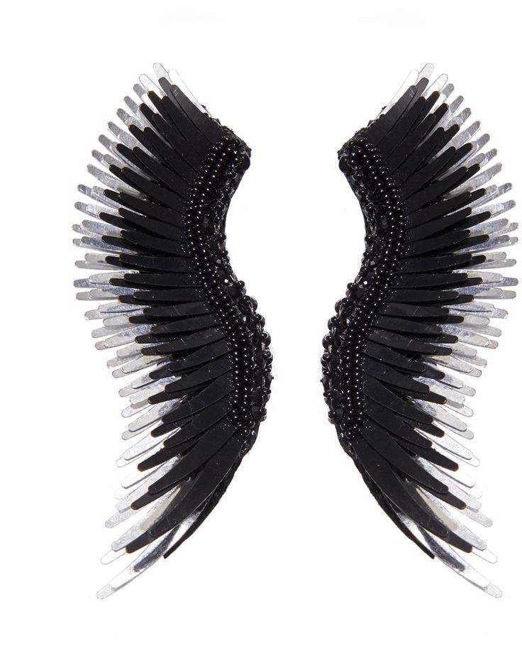 two black and white hair combs on a white background