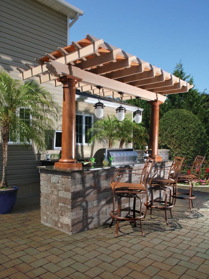 an outdoor kitchen and dining area is featured on the website, which has been updated to include