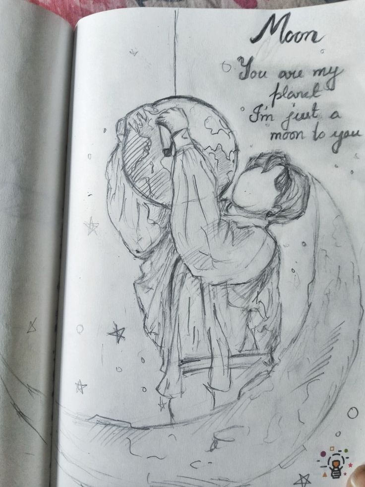 an open book with a drawing of a person holding a baby in it's arms