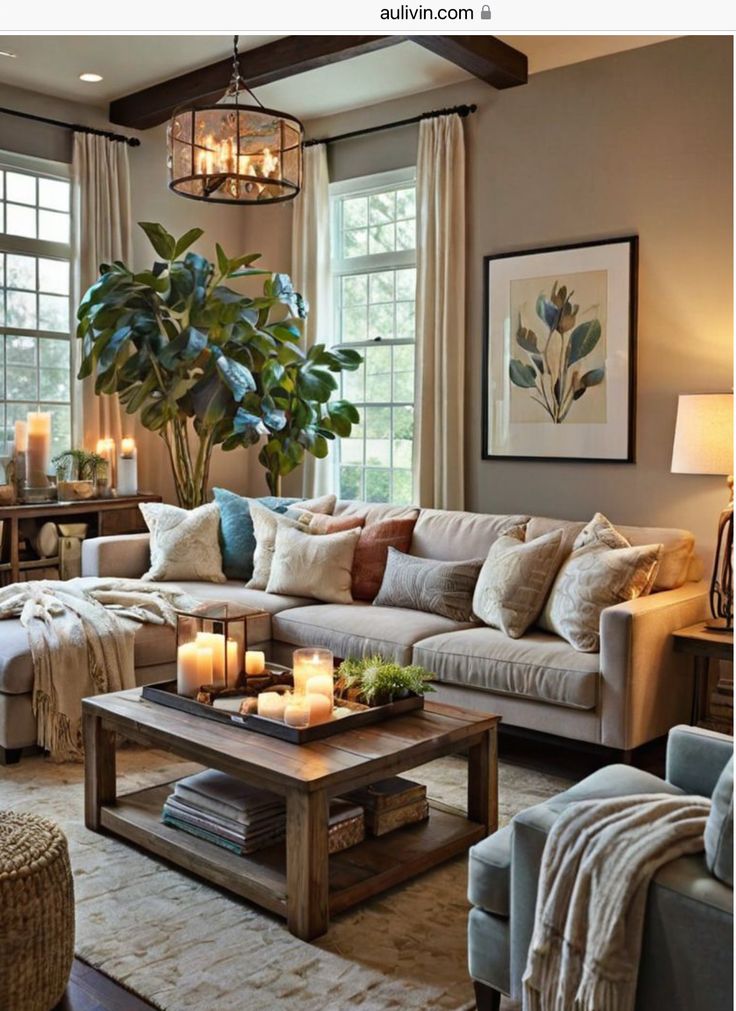 a living room filled with furniture and candles