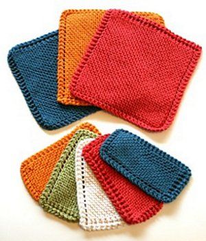 four crocheted coasters in different colors