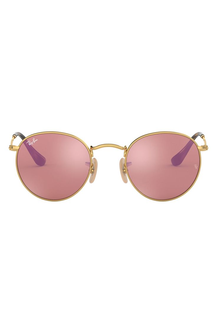 Round, retro-chic frames style eye-catching sunglasses that serve as an eclectic addition to your everyday style. 50mm lens width; 21mm bridge width; 145mm temple length. 100% UV protection. Metal/crystal lens. By Ray-Ban; made in Italy. Pink Metal Frame Sunglasses For Summer, Summer Pink Sunglasses With Metal Frame, Classic Pink Sunglasses With Mirrored Lenses, Modern Pink Sunglasses With Tinted Lenses, Pink Round Frame Polarized Sunglasses, Pink Sunglasses With Mirrored Lenses And Round Frame, Modern Pink Sunglasses With Gradient Lenses, Classic Pink Sunglasses With Uva Protection, Pink Round Frame Sunglasses With Mirrored Lenses