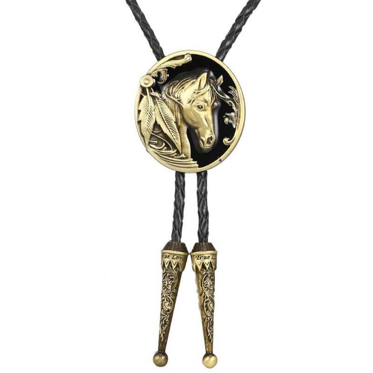 Introducing the Horse Bolo Tie, a captivating symbol of the legendary cowboy lifestyle and the enduring bond between humans and horses. Crafted with braided leather cords measuring 38" (96cm) in length and featuring metal tips, this bolo tie boasts a pendant size of 1.6" (4.2cm) x 1.8" (4.7cm), meticulously crafted from high-quality zinc alloy.  The Horse Bolo Tie embodies the spirit of adventure and freedom that defined the American West. Its exquisitely embossed horse head medallion serves as Southwestern Lariat Bolo Tie For Rodeo, Western Lariat Bolo Tie With Adjustable Length, Western Style Lariat Bolo Tie With Adjustable Length, Rodeo Lariat Bolo Tie With Adjustable Length, Concho Lariat Bolo Ties For Rodeo, Vintage Bolo Ties With Adjustable Length For Rodeo, Vintage Lariat Bolo Ties For Rodeo, Vintage Bolo Tie With Adjustable Length For Western Events, Bohemian Lariat Bolo Tie For Rodeo