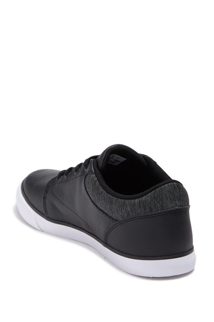 This sleek low-top sneaker made from smooth leather with a knit collar is one you can pair with casual and more polished looks alike. Leather and textile upper/textile lining/synthetic sole Imported Classic Low-top Synthetic Skate Shoes, Black Textile Sneakers For Skateboarding, Black Textile Skateboarding Sneakers, Classic Synthetic Skate Shoes With Vulcanized Sole, Casual Synthetic Skate Shoes With Cushioned Footbed, Synthetic Sneakers With Contrast Sole For Skateboarding, Classic Synthetic Skate Shoes With Contrast Sole, Black Synthetic Skate Shoes With Textured Sole, Synthetic Skateboarding Sneakers With Contrast Sole