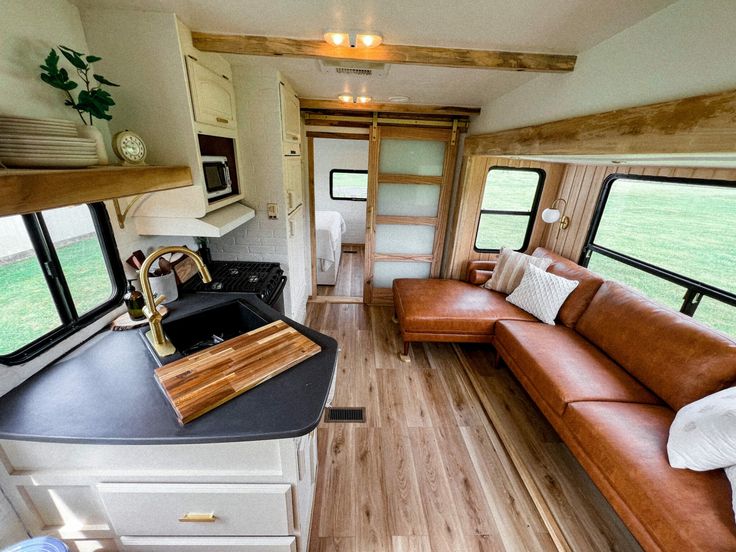 a kitchen and living room in an rv