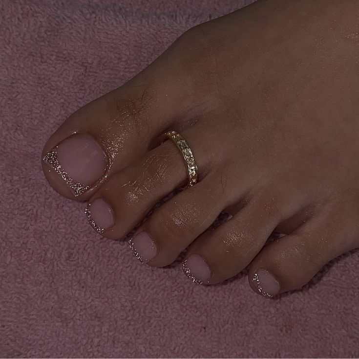 Sparkle French Pedicure, Neutral Toenail Designs, New Years Eve Toe Nails Ideas, French Tip Pedicure With Glitter, Pedicure New Years, Pedicure With Rhinestones Toenails, New Years Nails Toes, New Years Toes Nails, Gel X Pedicure