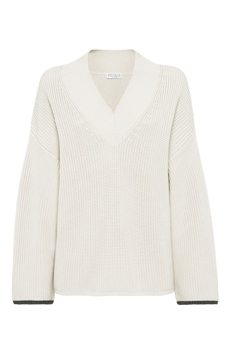 Fresh, lightweight and also comfortable, the pure cotton yarn offers the right amount of protection, particularly during the transitional months and warm weather. V-neck Drop shoulder Wide sleeve English rib Nickel-free monili decoration Latest Sweater, The Pure, Half Zip Sweaters, Beige Sweater, Wide Sleeves, Zip Sweater, Ribbed Sweater, Knit Cotton, Brunello Cucinelli