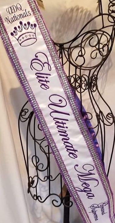 a purple sash sitting on top of a table