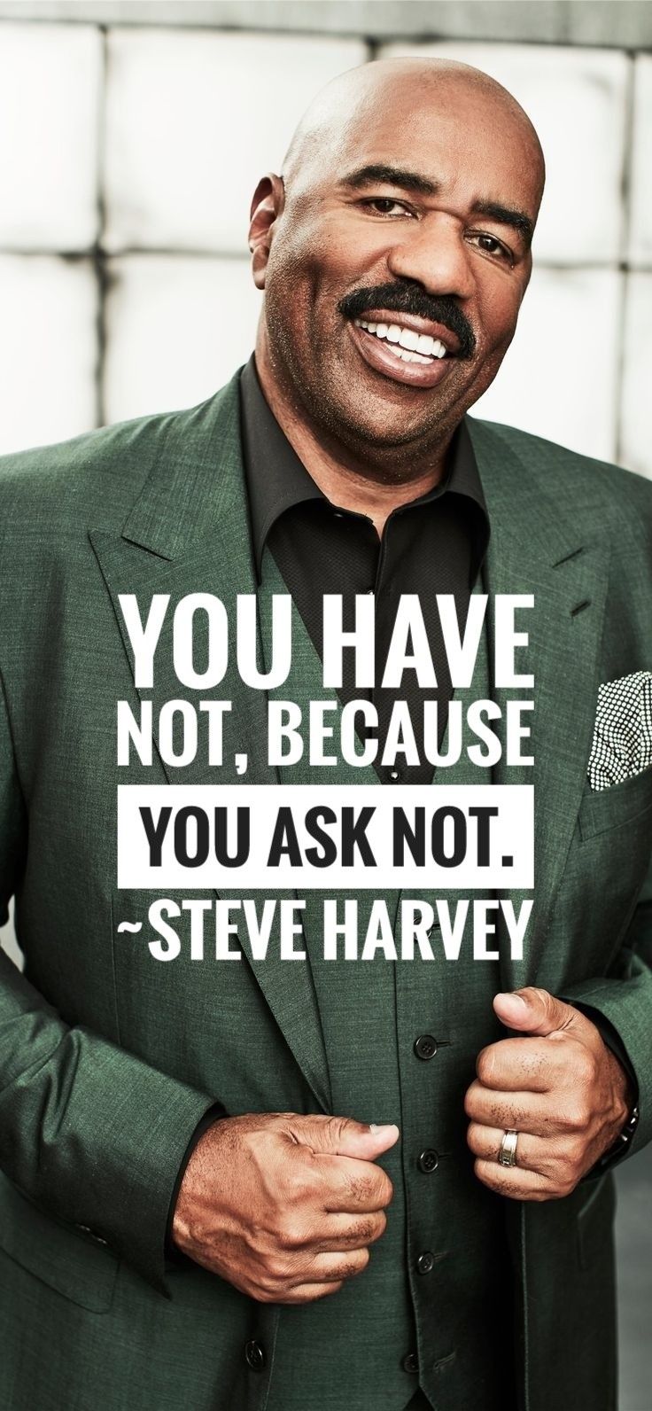 a man in a green suit and black shirt with a quote on his chest that says, you have not because you ask not steve harvey