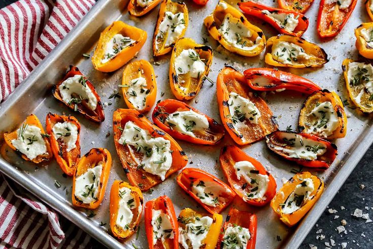 baked stuffed bell peppers on a baking sheet