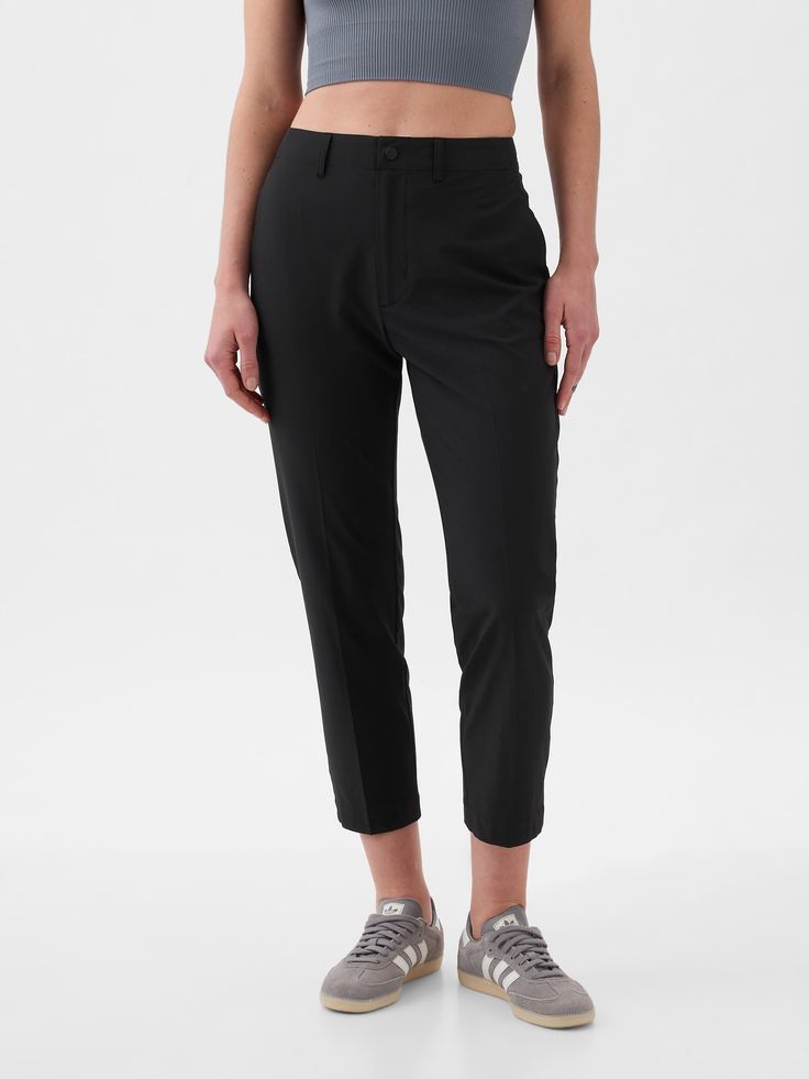 Soft stretch woven lightweight pants.  E-waist with button closure, zip fly.  Front slant pockets, back welt pockets.  This pant is made with 86% recycled polyester.  Using recycled materials helps to conserve resources and reduce waste.  This product was made in a factory that invests in gender equality and women’s empowerment.  Through RISE Reimagining Industry to Support Equality) and Gap Inc. ’s program P. A. C. E.  Personal Advancement & Career Enhancement), we support people who make our c High Rise Pull On Pants, Sporty Gap Bottoms With Side Pockets, Stretch Bottoms With Comfort Waistband In Recycled Polyester, Functional Mid-rise Elastane Pants, Classic Gap Bottoms With Welt Pockets, Relaxed Fit Bottoms With Pockets In Recycled Polyester, Functional Bottoms With Elastic Waistband For Work, Gap Relaxed Fit Mid-rise Pants, Gap Workwear Pants With Welt Pockets