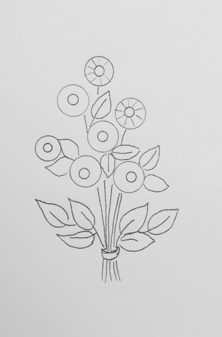 a drawing of a bouquet of flowers on a sheet of paper with the words donuts in it