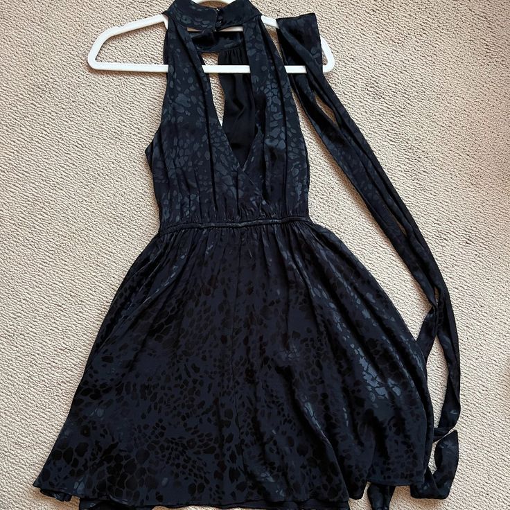 Nwt Beautifully Detailed Anthropologie Dress. Subtle Leopard Print, Three Buttons On Back With Optional Belt. Black A-line Dress With Tie Back, Sleeveless Black Mini Dress With Tie Back, Fitted Black Dress With Tie Back, Black Tie Back Dress For Party, Black Tie-back Cocktail Dress, Black Tie Back Cocktail Dress, Spring Black Dress With Tie Back, Black Halter Neck Mini Dress With Tie Back, Black Tie-back Dress For Night Out