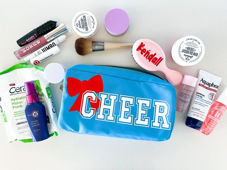 the contents of a personal care bag laid out on top of a white countertop