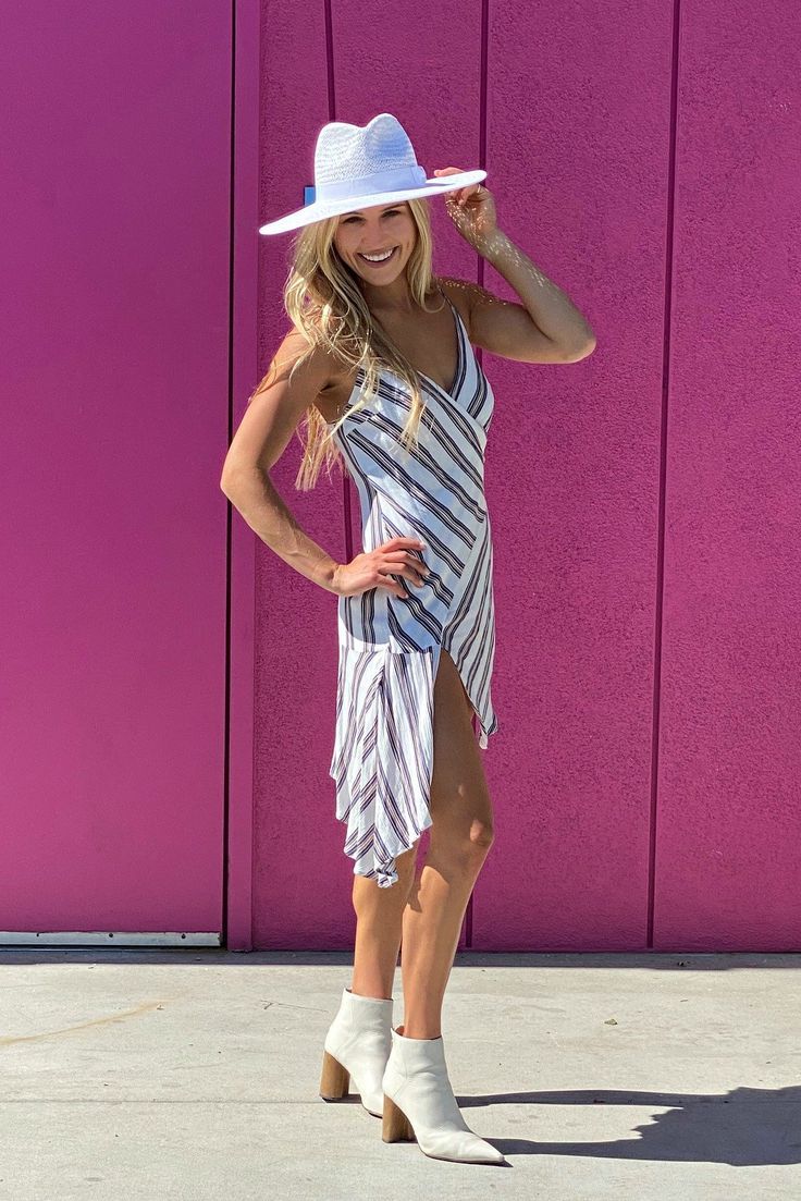 Our Palm Desert Panama fit in perfectly on our latest road trip photo shoot. Stunning, classic, chic - everything you've ever wanted in a hat. Featuring a molded crown with a pinched 10cm brim and hand woven straw, it's crystallized on the tone on tone ribbon with a simple Swarovski rivet. -Rancher style hat with a chill & casual vibe-Brim is flexible but holds its shape-Coordinating ribbon band-Pinched top-Great quality-- will last forever-This color actually goes with everything effortless Chic Spring Straw Hat For Travel, Beachwear Hat For Spring Travel, Spring Travel Beachwear Hat, Spring Beach Hat Unlined, Unlined Beach Hats For Spring, Beachwear Straw Hat For Spring Day Out, Spring Beachwear Straw Hat For Day Out, Spring Striped Straw Hat, Striped Curved Brim Straw Hat For Summer