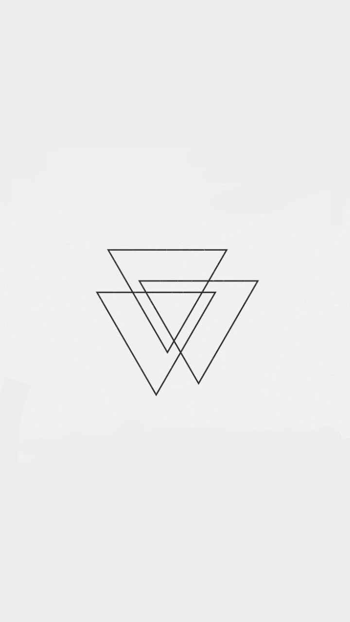 a black and white photo of a triangle with the letter v in it's center