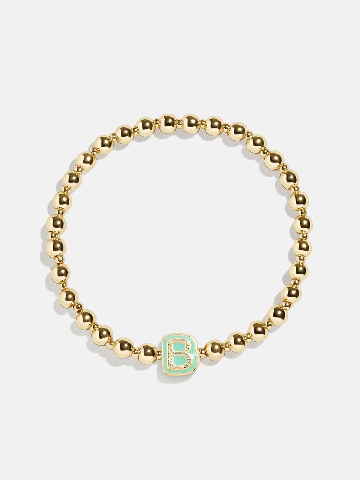 Give your mini the best of both worlds when you scoop up this two-in-one, super stackable bracelet set. The Initial & Heart Kids' Pisa Bracelet Set will feature the initial of your choosing crafted in vibrant enamel and flanked by gold ball beads. We paired each initial with a white enamel heart bracelet, ensuring your little's bracelet stack will be extra meaningful. READY TO GIFT: This item comes pre-packaged in a beautiful box. Please note: intended for children 3+ Heart Kids, Gold Bracelet Set, Stackable Bracelets, Heart For Kids, Beaded Stretch Bracelet, Heart Bracelet, White Enamel, Bracelet Stack, Bracelet Sizes