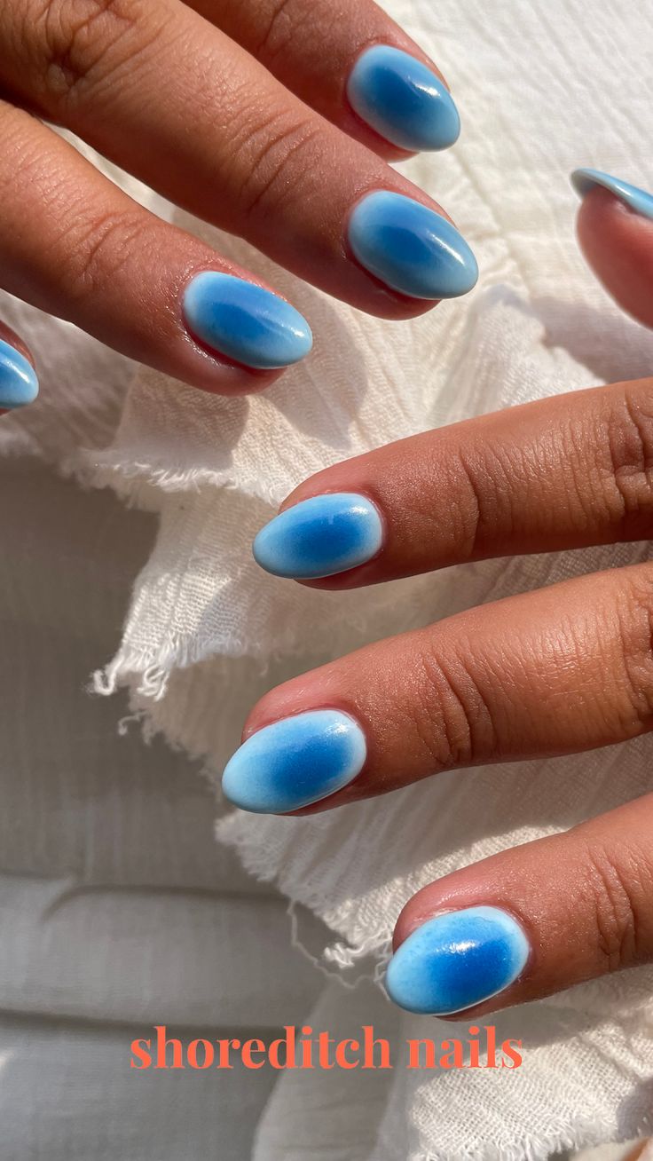 Blue aura nails almond shape nails orb nails blue trending nails trending nail art Small Cute Nail Designs, Short Natural Nail Designs Gel Blue, Single Color Nail Designs, Blue Aura Nails Almond, Cute Winter Nail Ideas Simple, Blue Bubble Nails, Winter Aura Nails, Teal Aura Nails, Navy Blue Aura Nails