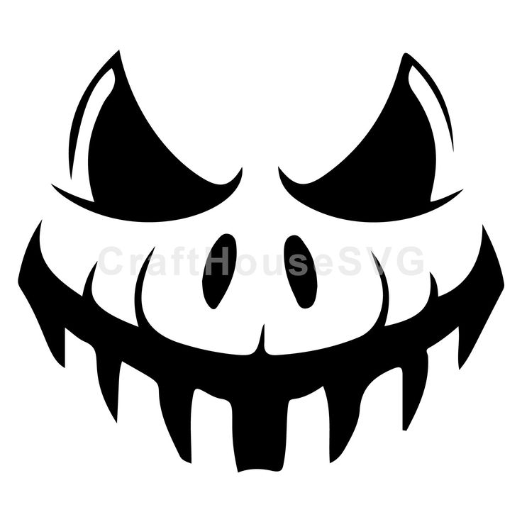 a black and white halloween pumpkin face