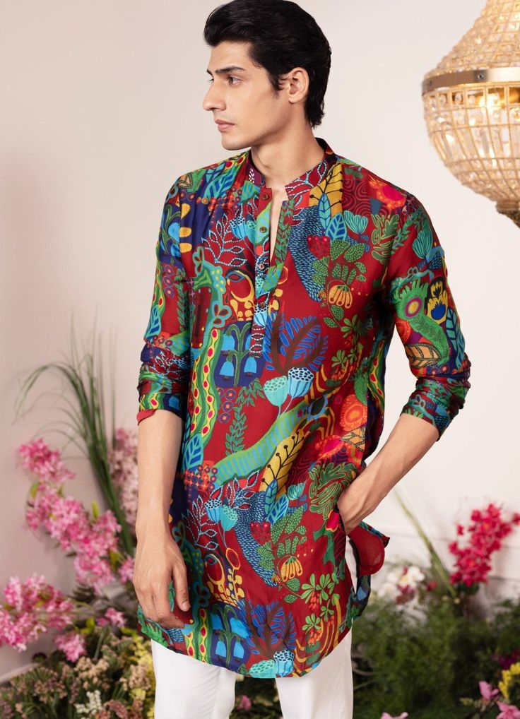 Introducing the Enchanted Forest Printed Kurta , an ideal ensemble for Mehendi and Sangeet. This printed kurta features a various vibrant botanical motifs on a crimson background, bringing an elegant vibe to your celebrations. Buy matching pants to complete the look here. Composition : Organza Satin Care: Dry Clean Only and Vacuum Storage This product can be customized for sleeves, length and colour Delivery : 2-4 weeks as the product is hand crafted. Check Size Guide or choose MySize for free customisation (All Sizes above XL can be made at 15% additional cost) For more information and sizes please contact fabiliciousfashion@gmail.com or visit our Copenhagen studio. About the Designer : Get ready to be blown away by the incredible talent of Juhi Bengani! This Kolkata-born actuary has disc Festive Printed Silk Kurta, Summer Silk Kurta With Digital Print, Printed Silk Kurta For Festive Occasions, Festive Summer Kurta With Digital Print, Bollywood Style Digital Print Kurta For Summer, Bollywood Style Summer Kurta With Digital Print, Bollywood Style Kurta With Digital Print For Summer, Summer Festive Multicolor Kurta, Multicolor Digital Print Kurta For Festive Occasions