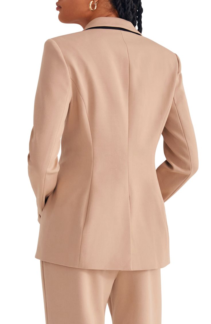 Chic for the office or the weekend, this one-button blazer exudes sophisticated style with smooth stretch fabric and a slighlty oversized fit. 28" length (size Medium) Notched lapels 63% polyester, 32% rayon, 5% elastane Dry clean Imported Chic Notch Lapel Office Blazer, Chic Career Suits With Notch Lapel, Professional Structured Office Blazer, Chic Notched Career Suit, Chic Notched Suit For Career, Chic Career Suits With Welt Pockets, Chic Office Blazer With Pressed Crease, Chic Office Wear Blazer With Pressed Crease, Chic Structured Blazer For Office Wear