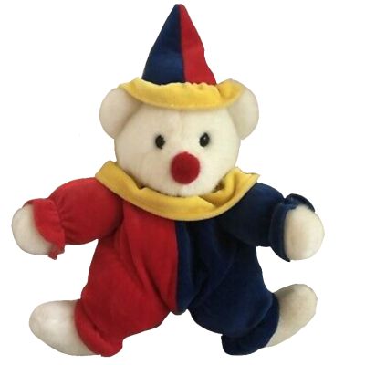 a teddy bear wearing a red, blue and yellow hat with a scarf around it's neck