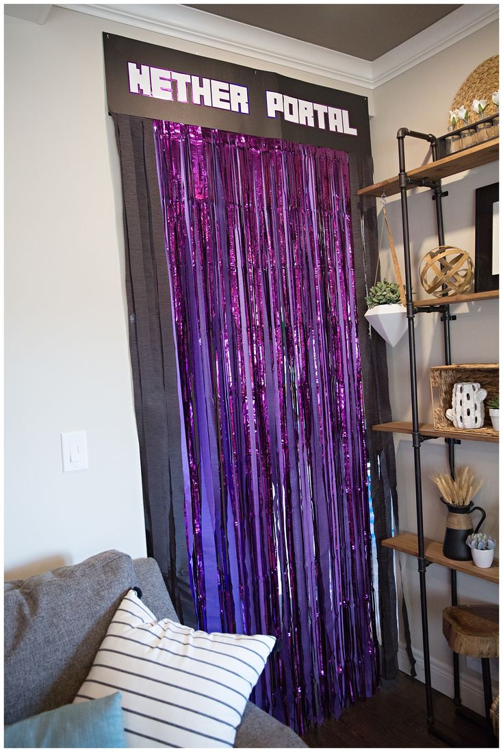 a purple curtain is hanging in front of a window with the words mether portal on it