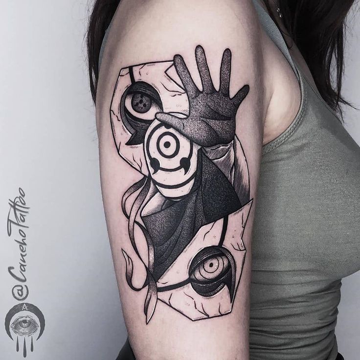 a woman's arm with a tattoo on it and an image of a hand