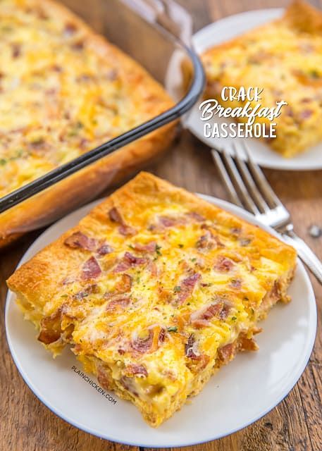 a close up of a slice of casserole on a plate with a fork