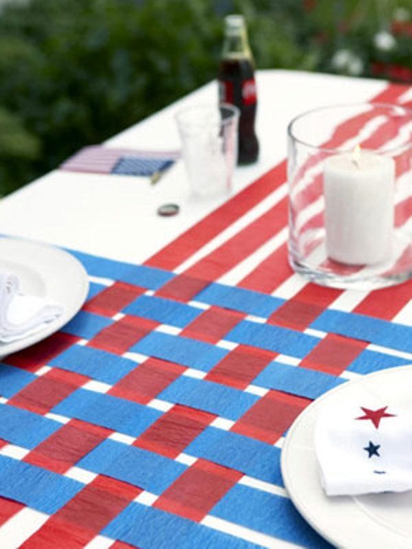 the table is set with red, white and blue napkins