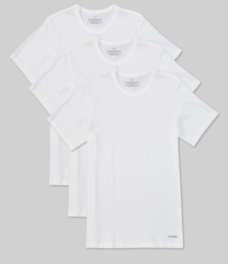 From Calvin Klein, these t-shirts feature:3-packSolid colorcrew necklineShort sleevespullover stylingSlim fitSignature classic designed with pure cotton for a soft hand and breathable comfortcottonmachine wash; tumble dryImported. Classic Calvin Klein Cotton Tops, Classic Calvin Klein Crew Neck Top, Classic Calvin Klein Tops For Everyday, Stretch Cotton Calvin Klein Tops, Calvin Klein Stretch Cotton Tops, Beauty Expert, Dillard's, Soft Hand, White Undershirt