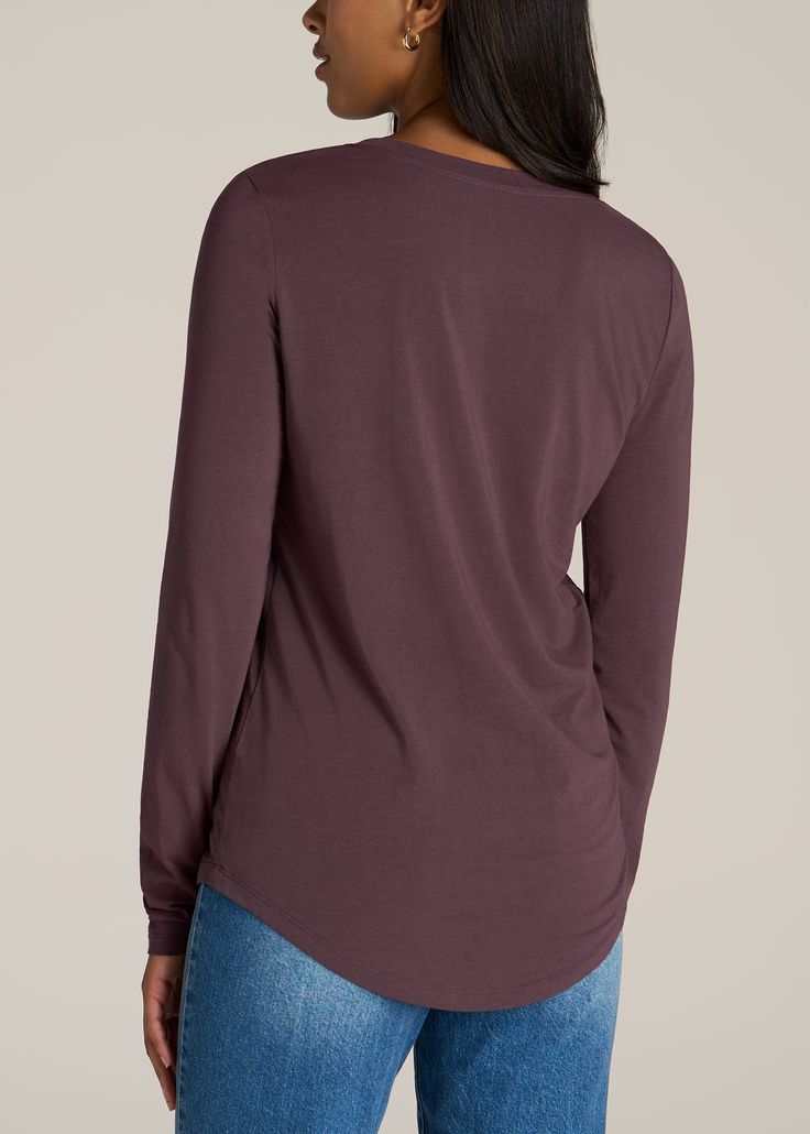 About Our Long Sleeve Scoop V-Neck Tee Shirt for Tall Women There’s something beautiful about basics. They’re the building blocks of your wardrobe and the staples of your everyday outfits. Your essentials should always fit perfectly, so we set out to create the fundamental Long Sleeve Scoop V-Neck Tee shirt for tall women. This women’s tall top has been tailored for your shape and height with extra-long sleeves and an extended hemline. The front features a casual scoop v-neck while the rear hem Solid Color V-neck Loungewear Top, Versatile Solid Color Tops For Loungewear, Solid Color V-neck Top For Loungewear, Casual Long Sleeve Scoop Neck Top For Layering, Versatile Scoop Neck Loungewear Tops, Versatile Scoop Neck Top For Loungewear, Versatile Crew Neck Tops In Solid Color, Versatile Solid Color Crew Neck Tops, Casual Long Sleeve Scoop Neck Top For Everyday