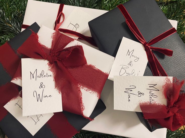 Black and white recycled and recyclable wrapping paper with burgundy chiffon and velvet bows Black And Red Wrapping Christmas Gifts, Black And Red Christmas Wrapping, Wrapping Inspiration, Xmas Gift Wrap, White Wrapping Paper, Velvet Bows, Gift Wrapping Inspiration, Holiday Mood, Christmas Inspo