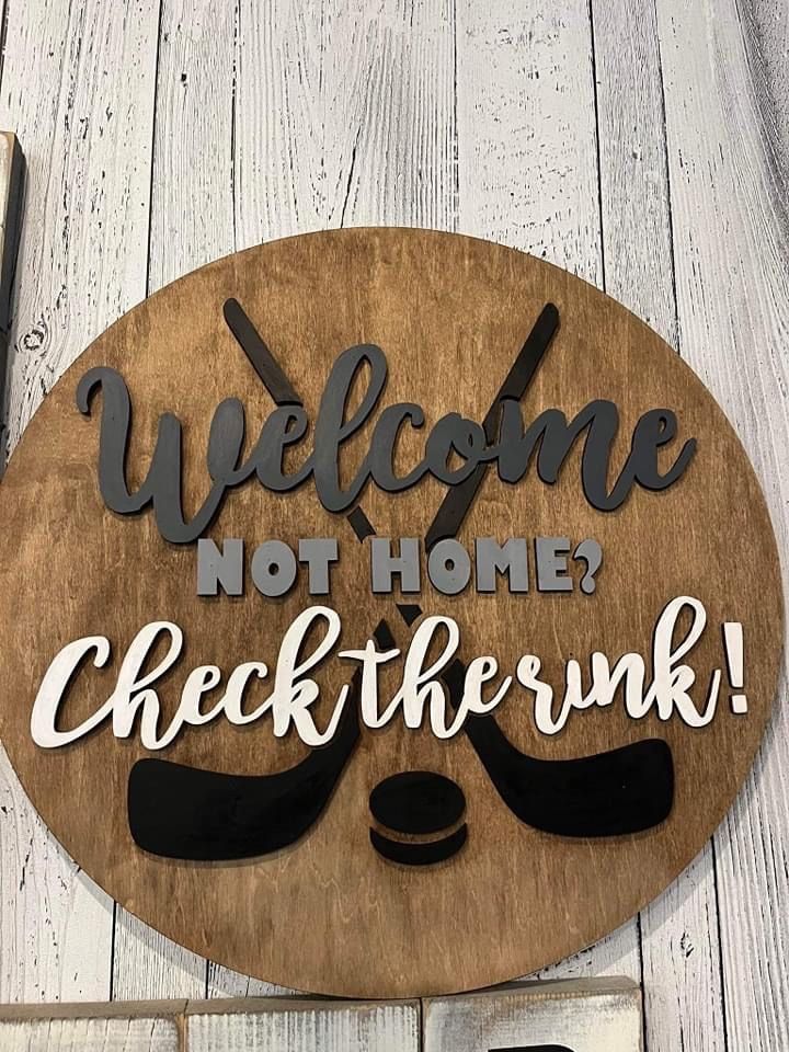 a wooden sign that says welcome not home check the punk on it with glasses and mustaches