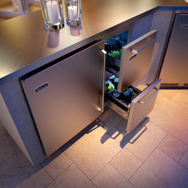 an open refrigerator in the middle of a kitchen