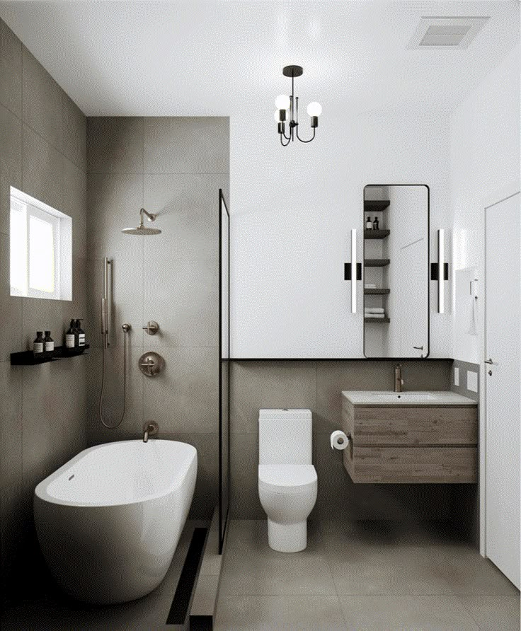 a bathroom with a tub, toilet and sink