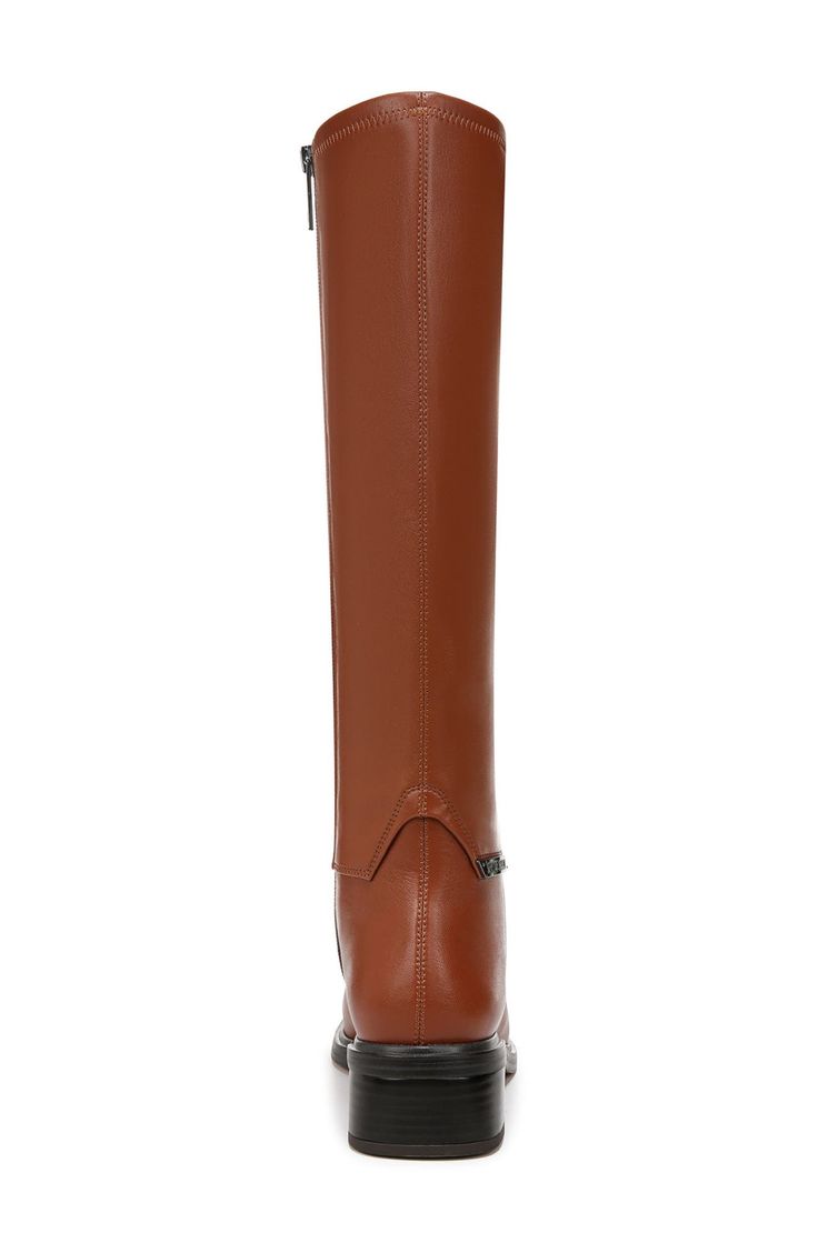 Classic details lend a refined appearance to this tall boot that's the perfect go-to for elevating in-office or off-duty looks. 1 3/4" heel; 6" shaft; 9 3/4" calf circumference Synthetic upper, lining and sole Imported Classic Tall Heeled Boots For Fall, Wide Calf Tall Boots For Workwear, Classic Knee-high Heeled Boots For Fall, Tall Boots With Reinforced Heel, Knee-high Boots With Stacked Heel For Office, Tall Heeled Boots For Formal Fall Occasions, Tall Heeled Boots For Fall Formal Events, Tall Medium Width Boots For Work, Tall Medium Width Work Boots