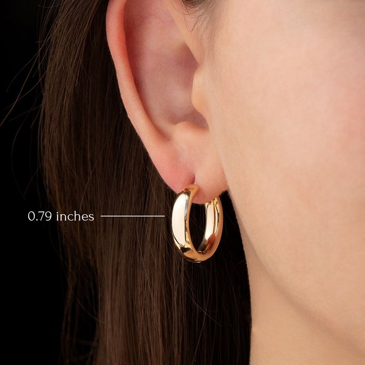 High quality 14K yellow gold hoop earrings with a safe closure, everyday use. Simple hoop earrings are in the type of huggies. They hugs your ears, you will not see the intersection of the earrings.  *Free Express International Shipping *Free returns within 14 days from the order date. NEXT BUSINESS DAY SHIPPING! PRODUCT DETAILS *Comes as a pair. *The product is made of 100% 14k Solid Gold and it has a 14K or 585 stamp on item. (We don't sell filled or plated jewelry) *The package includes a gol Classic 14k Gold Filled Huggie Earrings For Anniversary, Classic 14k Gold Filled Hoop Earrings For Anniversary, Dainty Huggie Hoop Earrings For Formal Occasions, Dainty Yellow Gold Hoop Earrings With Polished Finish, Classic Gold Plated Huggie Earrings For Anniversary, Dainty Polished Hoop Earrings As Gift, Minimalist Oval Huggie Earrings For Anniversary, Oval Tarnish-resistant Huggie Earrings For Anniversary, Hypoallergenic Huggie Jewelry For Anniversary