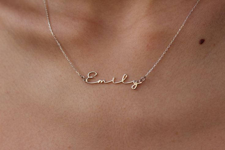 ♥ Mother's Day Gift, Personalized jewelry, Valentines Day Gift, 14k Solid Gold Name Necklace Item Detail: - Material: 14k Solid Gold -Hypoallergenic and Made for Sensitive Skin Colours: -14k solid yellow gold -14k solid white gold -14k solid rose gold ❤️PROCESSING TIME: 5-9 business days ❤️SHIPPING TIME: US is 2-9 days Worldwide is 5-15 days ❤️You can upgrade shipping to EXPRESS at check out if you want your package quicker ♥ UNIQUE AND PERFECT GIFT♥ -Birthday, holiday, a special occasion, or ju Elegant 14k Gold Jewelry With Names, Dainty Everyday Name Necklaces, Dainty Everyday Necklaces With Names, Dainty Everyday Nameplate Jewelry, Minimalist Sterling Silver Necklace With Hallmarks, Minimalist Everyday Jewelry With Names, Formal Sterling Silver Hallmarked Name Necklace, Delicate Sterling Silver Name Necklace For Anniversary, Minimalist Jewelry With Names For Anniversary