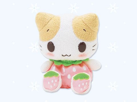 a white and brown cat stuffed animal sitting on top of a snow covered ground,