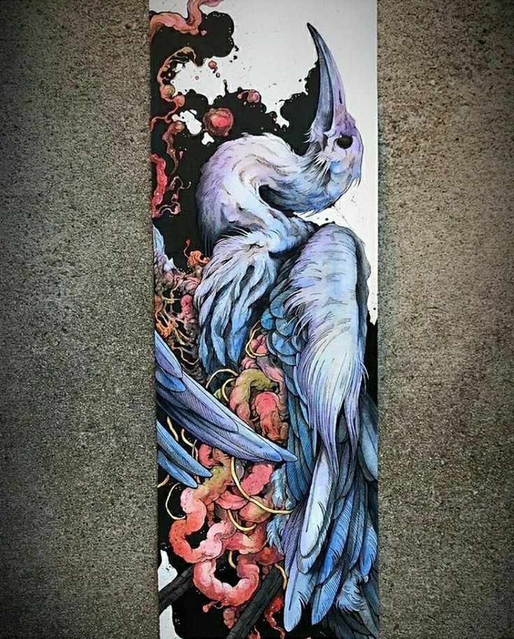 a skateboard with an image of a bird on it