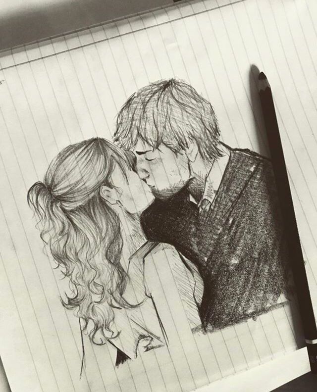 a pencil drawing of two people kissing in front of a notepad with writing on it